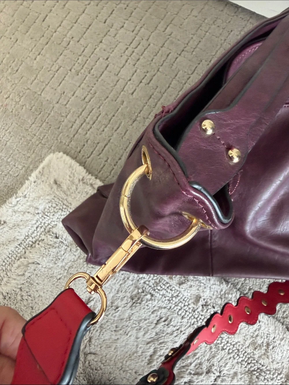 Large Burgundy leather bag with red and green accents